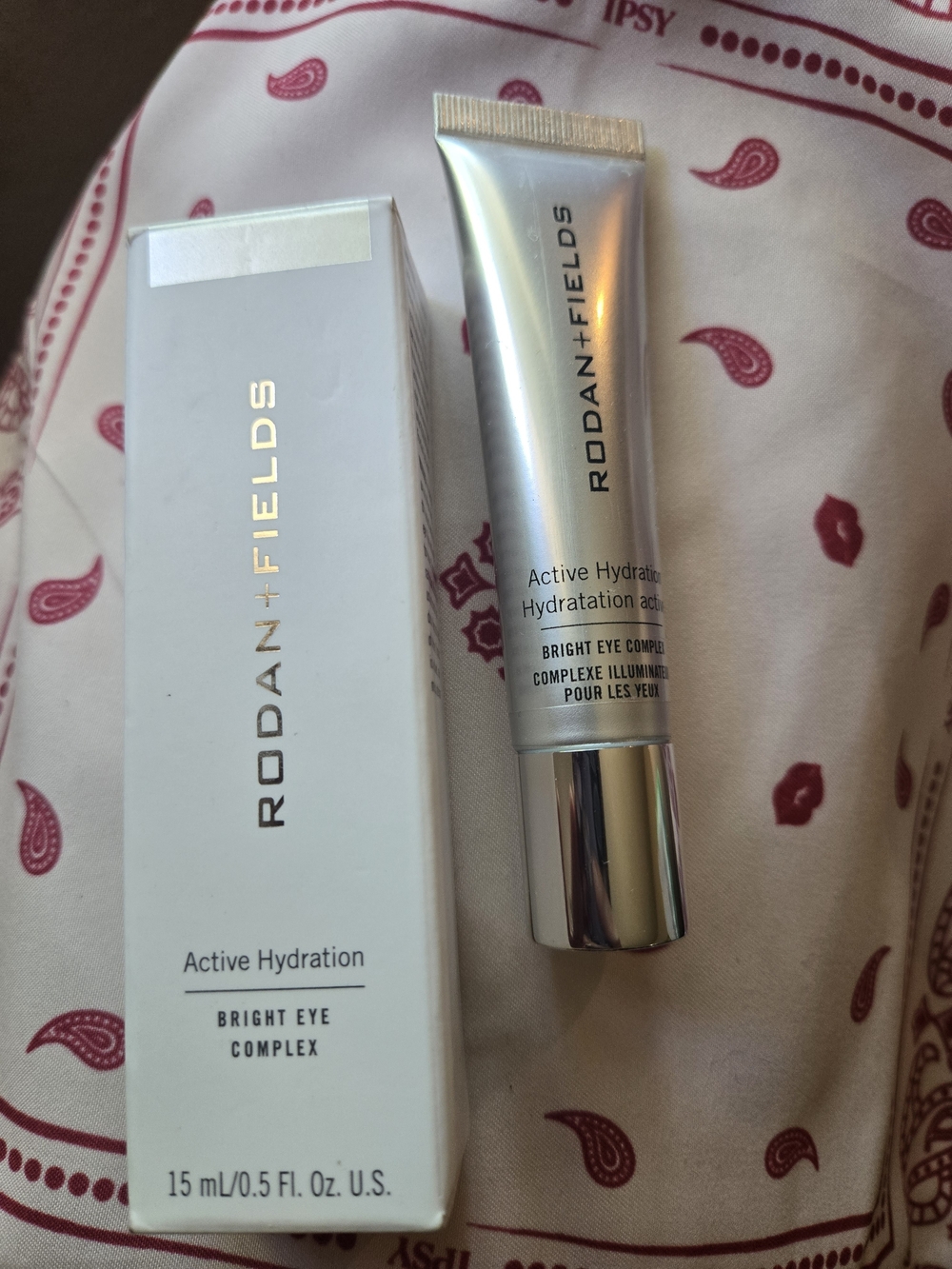 Rodan + Fields Bright Eye Complex in Silver Tube and White Box